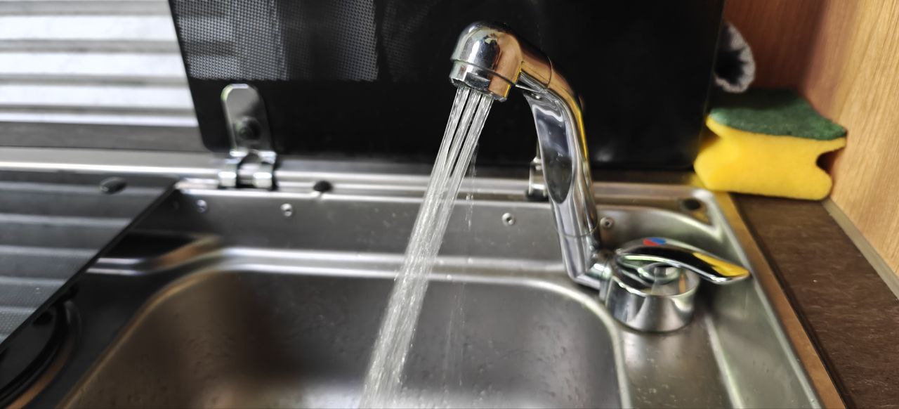 Tap from the camper pouring water