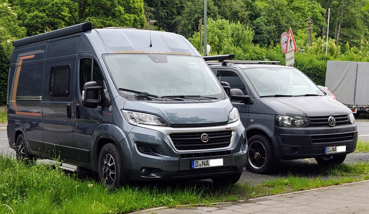 Our 2 camper vans together, the new in the left and the old in the right